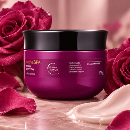 Pot d’huile crémeuse Nativa SPA Rosas Secretas 175 g entouré de roses et d’une touche de crème.