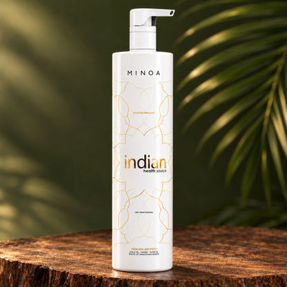 Flacon professionnel Minoa Indian Health Source Organic Protein 1 L sur un socle en bois